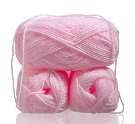 Bright woolen yarn for knitting isolated on white backgroundの写真素材