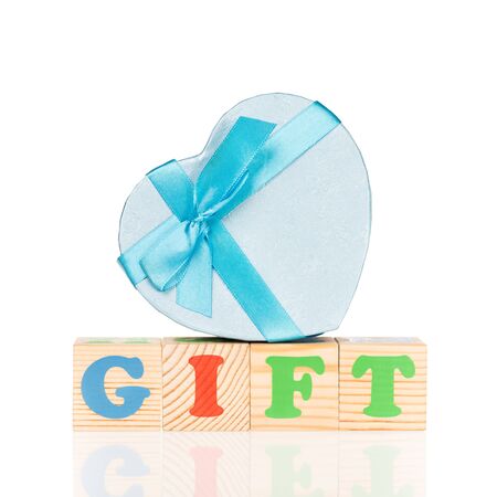 Bright gift box with new playing cubes isolated over white backgroundの写真素材