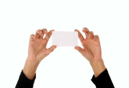 hand holding business cardの写真素材