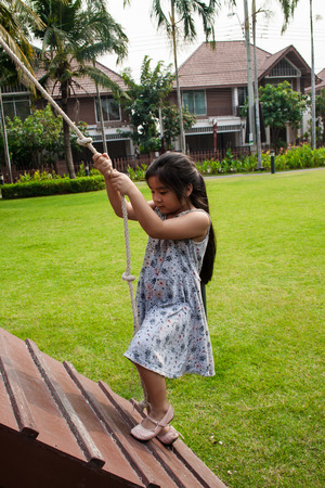 Child in the playgroundの写真素材