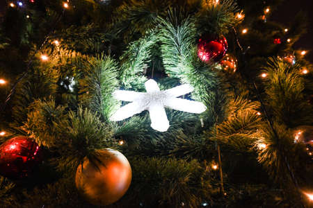 16 image series of an artificial Christmas Tree being put together, including gifts.の写真素材