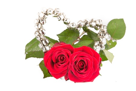 Roses within a metal heartの写真素材