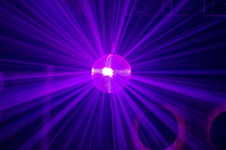 Photo of Purple Light Reflecting off a Disco Ballの写真素材