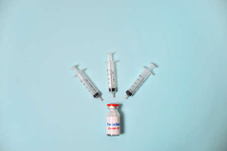 Seamless pattern glass bottle with covid-19 vaccine with red lid. New Corona virus infection novel...