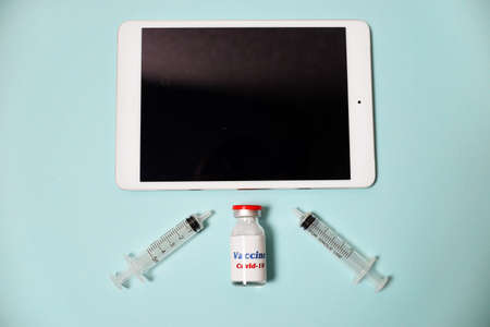 Seamless pattern glass bottle with covid-19 vaccine with red lid. New Corona virus infection novel virus disease background. Pandemic panic conceptor epidemic. prevention of seasonal vaccination.の写真素材