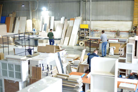 Background image of carpenters workshop: production equipment, various woodworking tools, wooden...