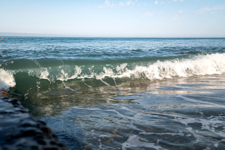 sea wave in back sunlight with place for text. Clean environment.の写真素材