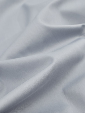 Smooth elegant gray silk or satin texture can be used as backgroundの写真素材