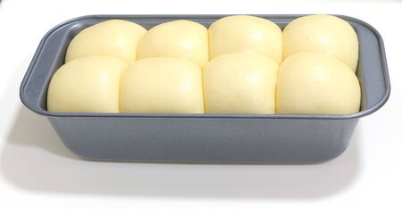 Dough flour in stainless steel trays.の写真素材