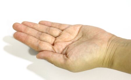 empty female woman hand holding isolated on white background.の写真素材