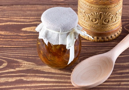 Orange homemade jam on rustic backgrounds.の写真素材