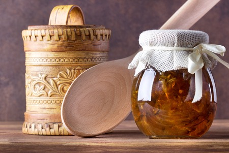 Fruit jam,marmalade in glass on wooden background.の写真素材
