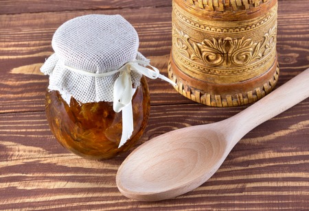 Fruit jam,marmalade in glass on wooden background.の写真素材