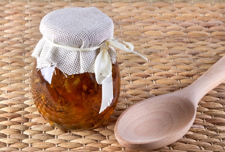 Two jar of honey from flowers on rustic background.の写真素材