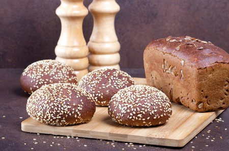 Fresh bread on rustic table.の写真素材