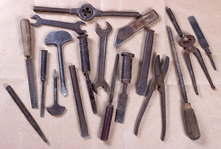 Wrenchs,various tools on wooden backgroundの写真素材