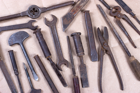 Wrenchs,various tools on wooden backgroundの写真素材