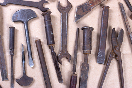 Wrenchs,various tools on wooden backgroundの写真素材