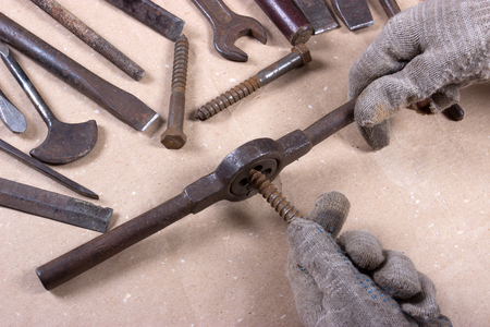 Wrenchs,various tools on wooden backgroundの写真素材