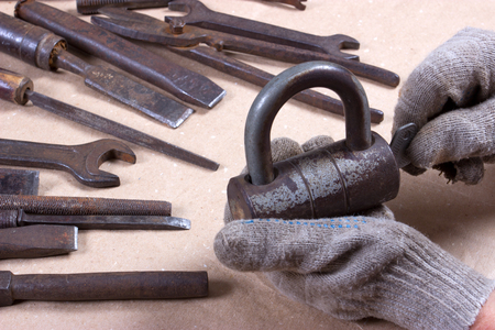 Wrenchs,various tools on wooden backgroundの写真素材