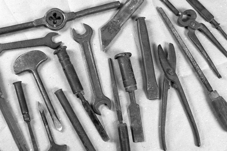 Wrenchs,various vintage tools on wooden backgroundの写真素材