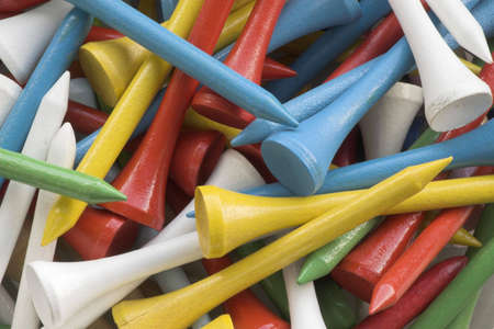 Multi colored golf tees. Background