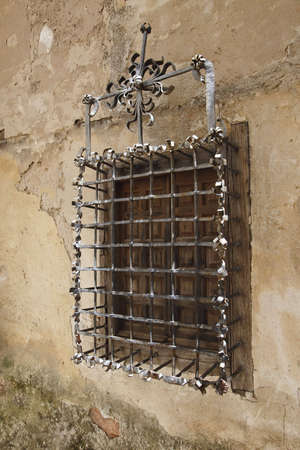 Old wall and lattice at the historic town of Cuenca, Spainの写真素材