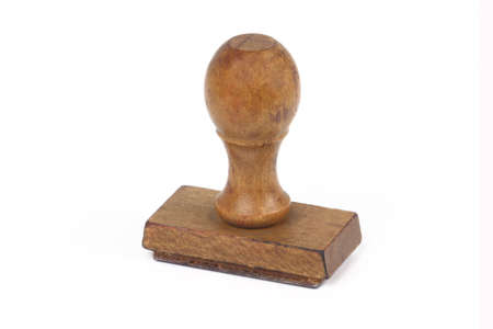 Close up of old rubber stamp on isolated white backgroundの写真素材