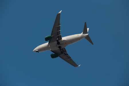 Airplane in the blue sky.