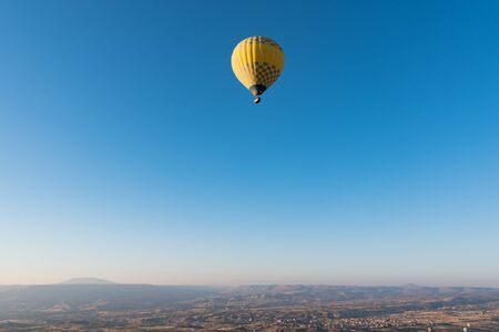 Hot air balloon flying over Cappadocia, Turkey.の写真素材