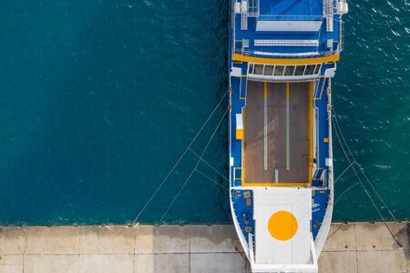 Top view of ferry boat moored in the pier, copy space.の写真素材