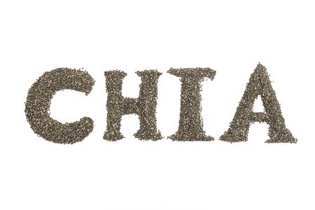 Word "CHIA" made of dry chia seeds on white background. Isolated, flat lay, design element. Chia superfood concept, paleo diet.の写真素材