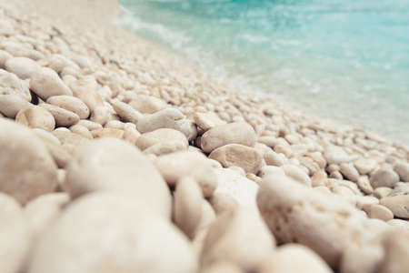 beautiful beach with round pebblesの写真素材