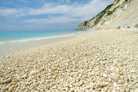 beautiful beach with round pebblesの写真素材