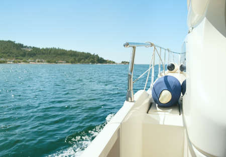 White motor yacht in sea at day. Private boat cruise concept.の写真素材