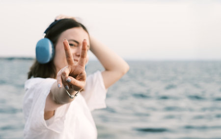 Portrait of woman with headphonesの写真素材