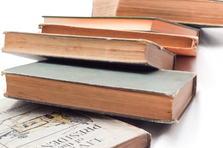 Classic Used Books Against White Backgroundの写真素材