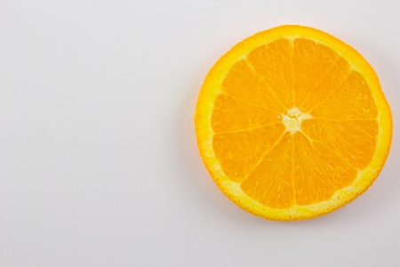 An orange against a white background