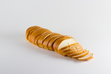A loaf of bread against a solid background.の写真素材