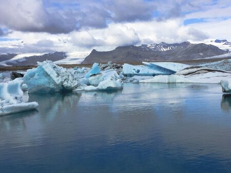 Photo of a broken off glacier part in the glacial lagoon of JÃ¶kulsÃ¡rlÃ³n, in the south of...
