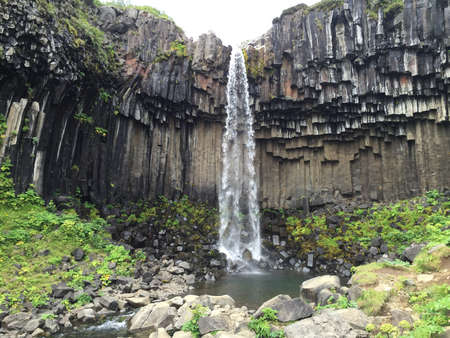 Photo of Svartifoss in South Iceland on a rainy morning