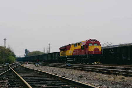 Train on the railroad tracks in the city of Dnipro, Ukraineの写真素材