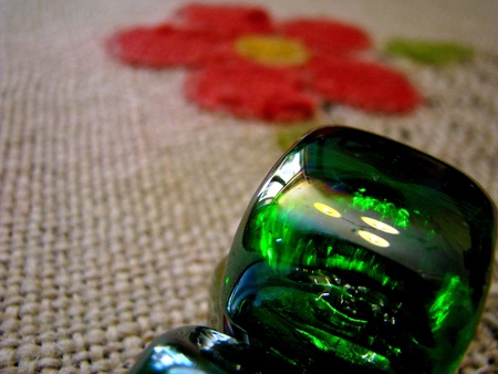 green glass under a chandelierの写真素材