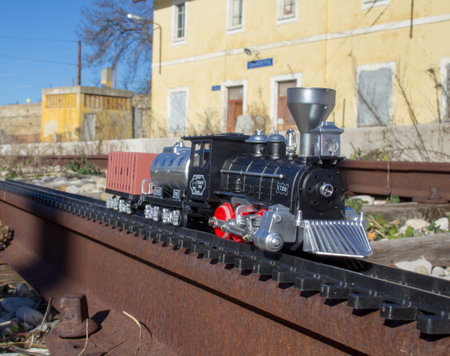 Toy train that runs along the real tracks of an old abandoned railway station in Italy.