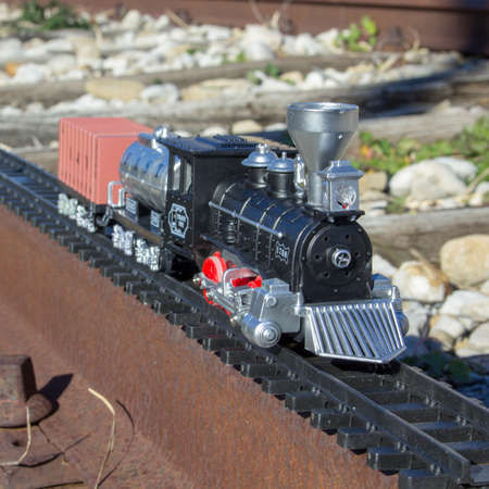Toy train that runs along the real tracks of an old abandoned railway station in Italy.