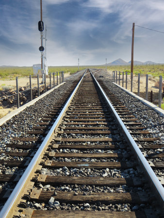 Railway in California, USA. Railroad tracks leading to the horizon.の写真素材