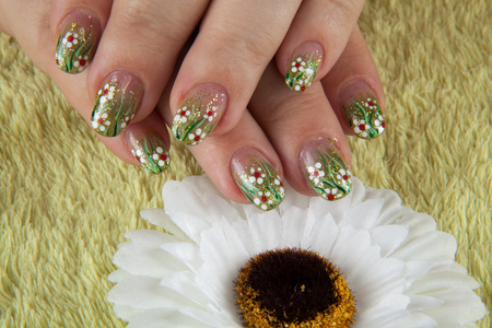 Manicure, fingernails with flowerの写真素材