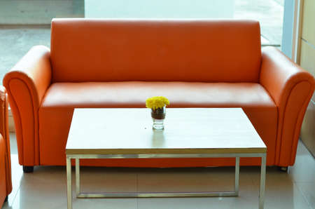 Orange sofa in wellcome office roomの写真素材