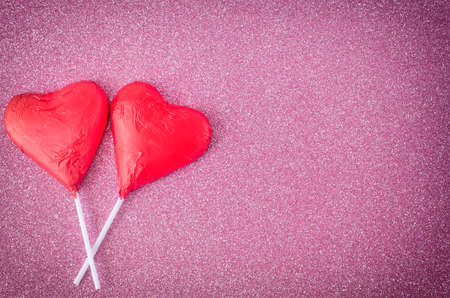 two hearts at pink bright backgroundの写真素材