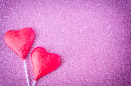 two hearts at pink bright backgroundの写真素材